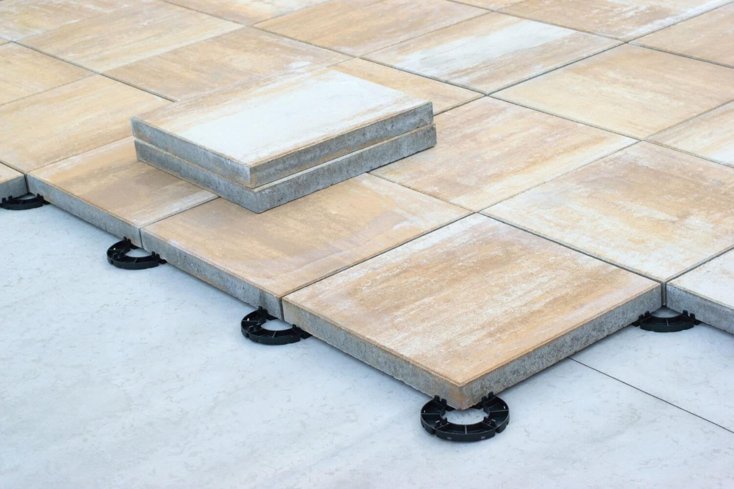 How to Lay Paving Slabs on Concrete - Oxcrete