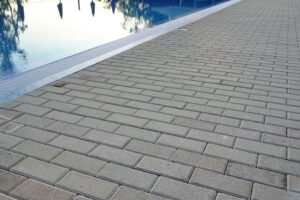 How a Paver Pool Deck Keeps Your Backyard Safe and Gorgeous outdoor moss gravel