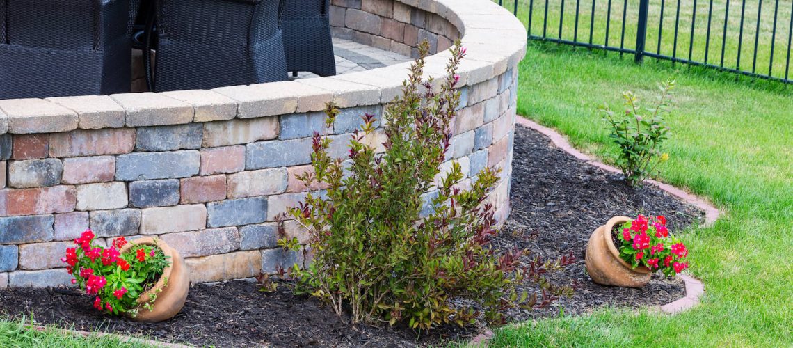 How a Retaining Wall Can Make The Most of Your Sloped Backyard design wall slope