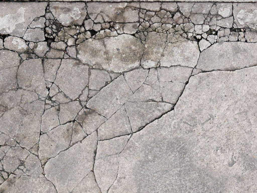 how to fix cracks in patio concrete